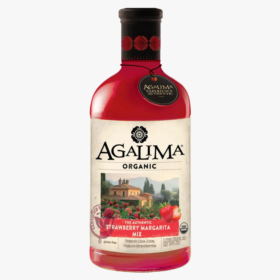 A bottle of Agalima Organic Strawberry Margarita Mix on a plain white background. The bottle is filled with a vibrant red liquid and features a cream-colored label with a scenic illustration of a vineyard and fresh strawberries.