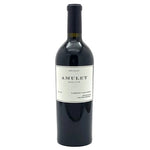 A bottle of Amulet Estate Cabernet Sauvignon from Napa Valley, featuring a dark glass bottle with a black capsule and a white label.