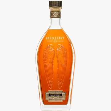 Angels Envy Oak Straight Bourbon Whiskey in a clear glass bottle with a cork stopper, showing the amber liquid and embossed angel wings on a white background.