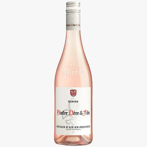 Bottle of Pieler Père à Fils Sabine Rosé wine on a white background