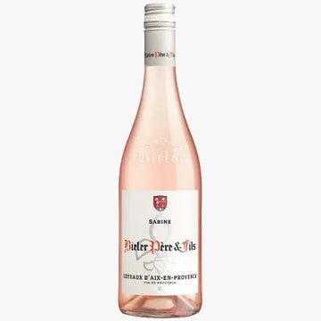 Bottle of Pieler Père à Fils Sabine Rosé wine on a white background