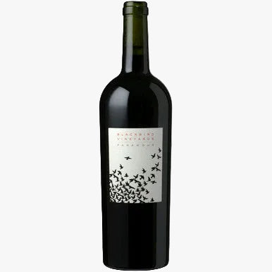 A dark glass bottle of wine with a white label featuring a black bird illustration and the text 'Bladern Vineyards' and 'Famourg'.