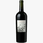 A dark glass bottle of wine with a white label featuring a black bird illustration and the text 'Bladern Vineyards' and 'Famourg'.