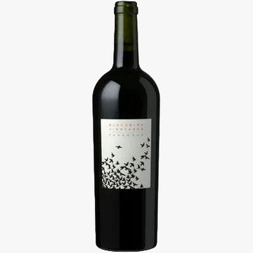 A dark glass bottle of wine with a white label featuring a black bird illustration and the text 'Bladern Vineyards' and 'Famourg'.