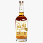 Bottle of Blue Note whiskey on a white background