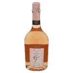 A bottle of Rosé Champagne with pale pinkish-amber liquid, a white label, and a pink foil top, isolated on a white background.