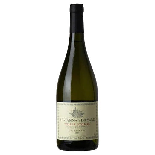 A bottle of Adrianna Vineyard White Stones Chardonnay 2023, featuring a dark green glass bottle with a black screw cap and a cream-colored label.