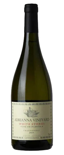 A bottle of Adrianna Vineyard White Stones Chardonnay 2023, featuring a dark green glass bottle with a black screw cap and a cream-colored label.