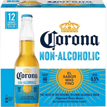 A 12-pack box of Corona Non-Alcoholic malt beverage, featuring a large image of a single bottle with a condered cap on the front, set against a white and blue background with yellow sunburst graphics.