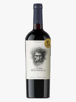 Red wine bottle with a label featuring a portrait and rating on a white background