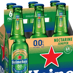 Heineken 0.0% alcohol-free beer six-pack with green bottles and blue caps.
