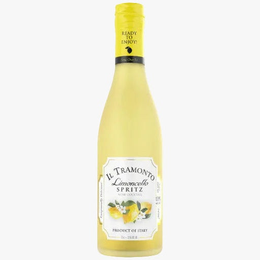 A bottle of Il Tramonto Limoncello Spritz non-alcoholic wine lemon oil, featuring a pale yellow liquid, a yellow screw cap, and a white label with lemon illustrations.
