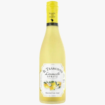 A bottle of Il Tramonto Limoncello Spritz non-alcoholic wine lemon oil, featuring a pale yellow liquid, a yellow screw cap, and a white label with lemon illustrations.