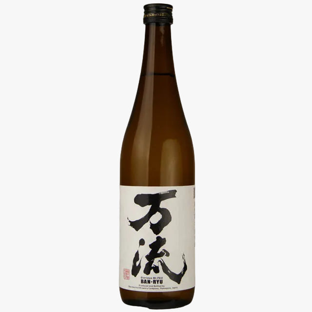 A single bottle of Japanese sake, specifically Bunkyu Daigin Rikyū, in a traditional brown glass bottle with a white label featuring black calligraphy.