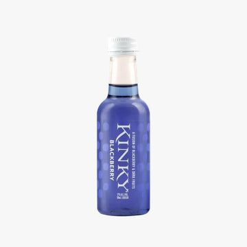 A small glass bottle of Kinky Blackberry liqueur with a translucent blue body, white cap, and white text, set against a pale peach background on a white surface.