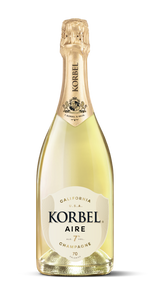A bottle of Korbel Aire Champagne with pale golden liquid, a cream-colored label, and a gold foil neck wrap, isolated on a white background.