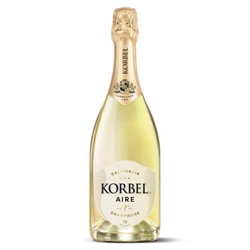 A bottle of Korbel Aire Champagne with pale golden liquid, a cream-colored label, and a gold foil neck wrap, isolated on a white background.
