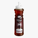 A bottle of Master &amp; Spy Demerara Simple Syrup, 970 ml (3.35 fl oz), with a white plastic squeeze top and a dark brown label, shown on a plain white background.