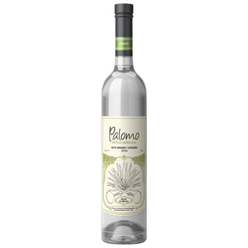 A bottle of Palomo 100% agave spirituous liquor on a solid white background.