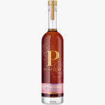 Penelope Bourbon bottle with gold cap and label on a white background