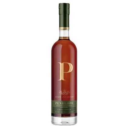 A bottle of Penelope Estate Collection Scotch whisky with a dark green cap, amber-brown liquid, and a gold and green label featuring a large gold letter P.