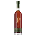 A bottle of Penelope Estate Collection Scotch whisky with a dark green cap, amber-brown liquid, and a gold and green label featuring a large gold letter P.