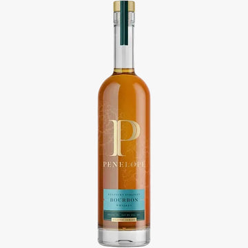 A bottle of Penelope Bourbon Whiskey on a solid white background. The bottle is filled with amber-colored whiskey and features a gold and teal label with a large gold 'P' logo.