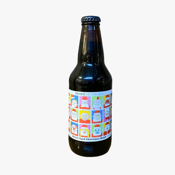 Dark glass bottle with a colorful label featuring cartoon faces on a white background