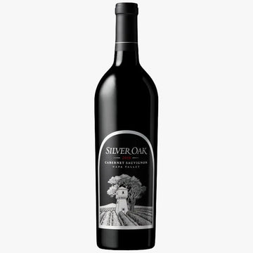A bottle of Silver Oak Cabernet Sauvignon from Napa Valley, featuring a black bottle and a white label with a detailed illustration of a vineyard and winery.