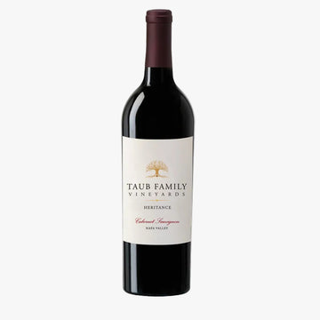 A bottle of Taub Family Vineyards Heritage Cabernet Sauvignon red wine, featuring a dark glass bottle with a cream-colored label and a dark red foil capsule, set against a plain white background.