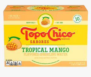 A Topo Chico Sabores Tropical Mango Flavored Sparkling Water 8-pack box, featuring a bright yellow and orange design with red and green branding text.