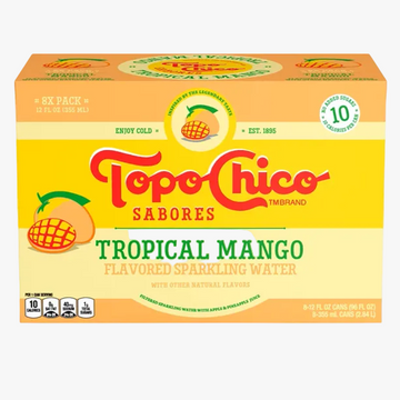 A Topo Chico Sabores Tropical Mango Flavored Sparkling Water 8-pack box, featuring a bright yellow and orange design with red and green branding text.
