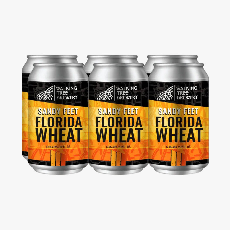 Three aluminum cans of Walking Tree Brewery Sandy Feet Florida Wheat beer arranged side by side on a white background.